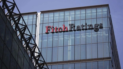 Fitch küresel büyüme tahminini yukarı yönlü revize etti