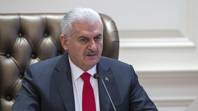 Başbakan: Katilleri şiddetle lanetliyorum