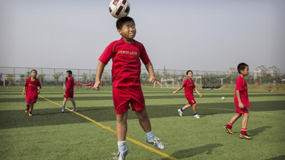 Çin 50 milyon futbolcu yetiştirecek