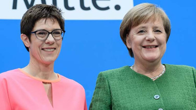 Merkel'in partisine taze kan